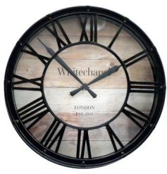This rustic round timepiece will fit in with a variety of decor schemes