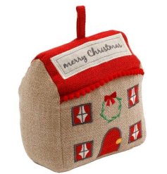 Add holiday charm to your home with this charming cottage-themed door stop. 