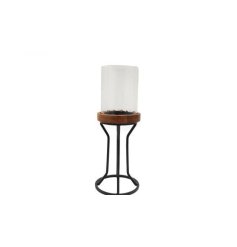 This minimalistic candle holder made from iron with a wooden base is great for adding a stylish look to the home. 