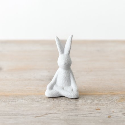 Add texture to your seasonal displays with this unique sitting yoga rabbit. 