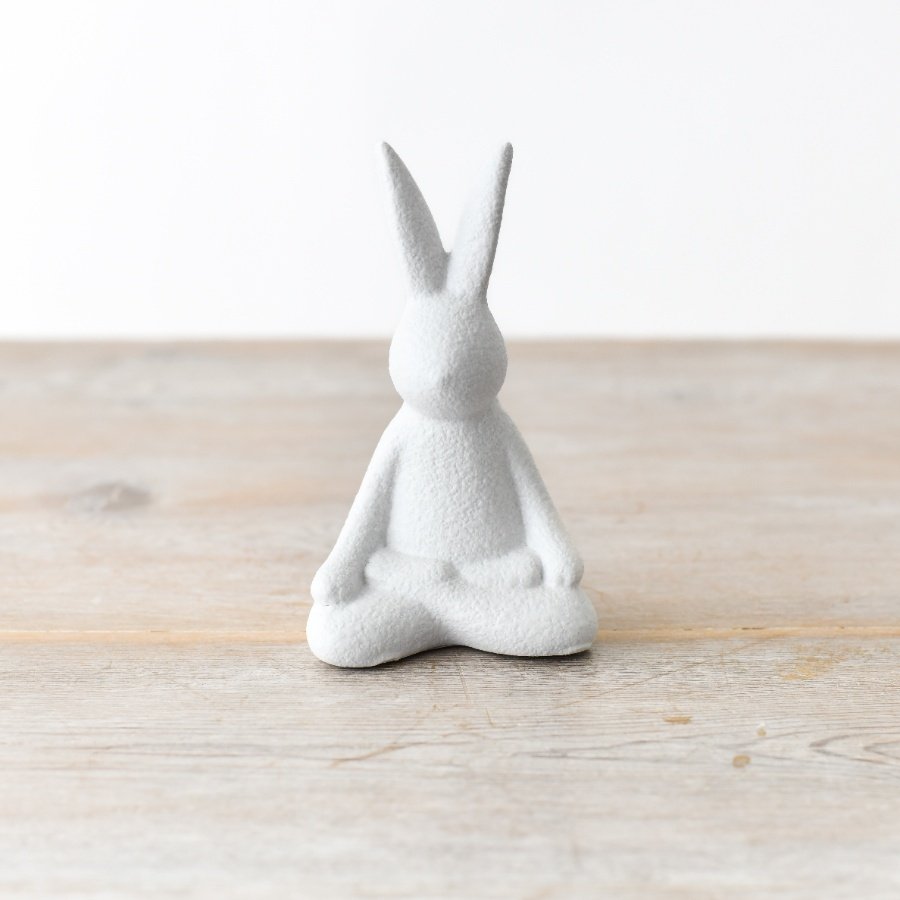 An elegant modern rabbit ornament showcasing a seated yoga pose, adding a textured touch to the home decor.