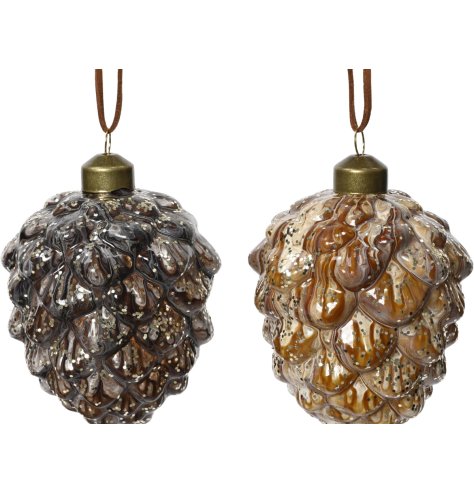 Shimmering paint drips on cone-shaped baubles for a touch of sparkle to your holiday décor.