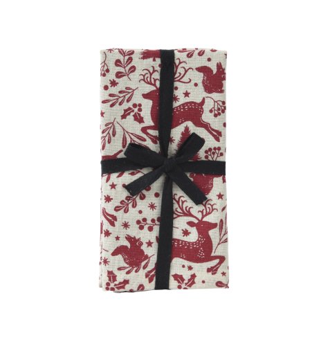 Celebrate the holidays in style with these festive cotton napkins adorned with a charming reindeer design.