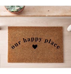 A classic coir doormat in a neutral colour with black scripted text a a heart motif. 