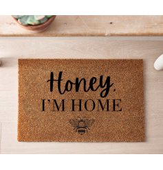 A sweet doormat featuring a bee motif and 'Honey I'm home' text. 