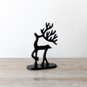 Elegant standing ornament featuring a black reindeer for a touch of festive charm. 