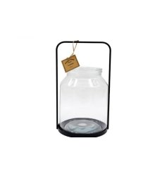 A chic glass lantern in a hurricane design. 
