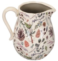This beautiful jug is decorated with foliage and acorns representing the forest floor