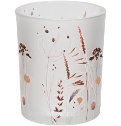 Home accessory: Lovely glass candle pot features a charming woodland floral design
