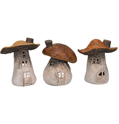 Add a touch of whimsy to your holiday decor with our charming tea light mushroom house. 