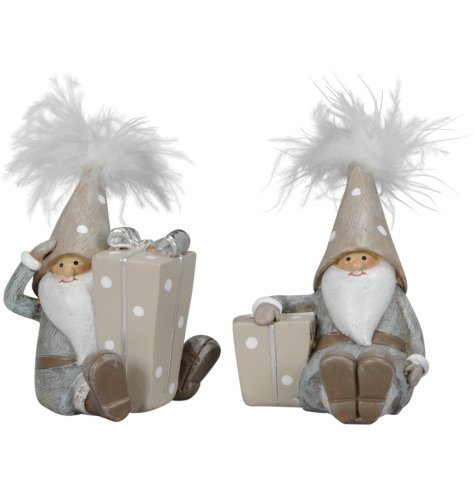 Two assorted gnomes featuring intricate details and a feather pom pom.