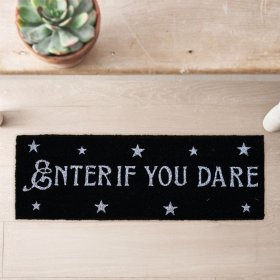 A top step door mat in jet black with Halloween text and star detail.