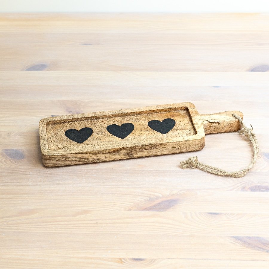 Enhance your culinary skills with our beautiful Choaping Board, showcasing an elegant black heart design.