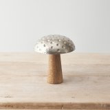 A contemporary aluminium and mango wood mushroom decoration