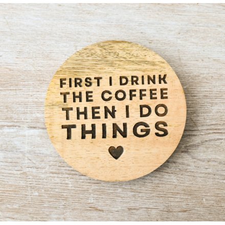 Start your mornings right with this stylish coaster that reflects your love for a daily dose of caffeine.