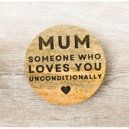 A natural wood circular coaster with a heartfelt mum quote. 