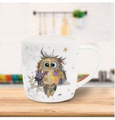 This delightful mug features a whimsical illustration of a wise owl, designed by the renowned Bug Art. 