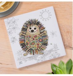 This delightful coaster features a hand-drawn illustration of a sweet hedgehog.