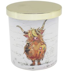 The Bug Art Kooks Highland Cow Candle, a charming addition to any home decor.