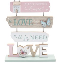 Spread love and add a touch of warmth to your space with our 'Love is all you need' plaque.