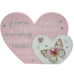 A heart shaped plaque with colourful butterfly and sentimental message.