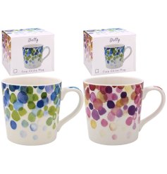 Indulge in a delightful cup of tea or coffee with our watercolour Dots china mug.