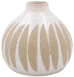 Introducing the stunning Parasol Patterned Vase, a must-have addition to any home decor collection.