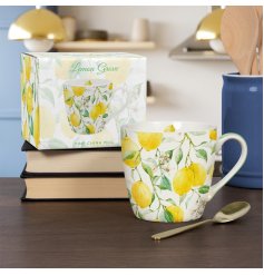 A charming breakfast mug from the Lemon Grove collection featuring a bright lemon design. 