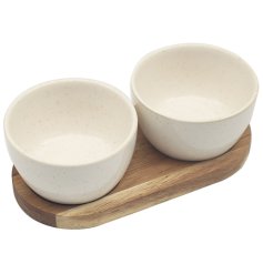 Crafted from high-quality wood with a beautiful natural tone, this duo features a wooden tray and two matching dishes