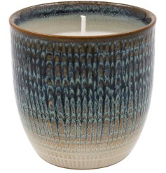This beautiful candle combines the calming hues of blue with a unique weave design, adding a touch of elegance