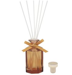 Indulge your senses with our charming diffuser, designed to infuse every room with a delightful fragrance.