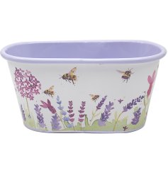 This beautiful planter features a charming bee and lavender design, adding a touch of nature to your outdoor space.