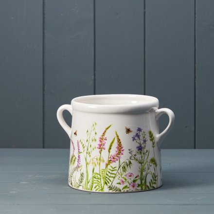 This wide pot adorned with a gorgeous meadow design is a great statement piece, it would look lovely on any windowsill