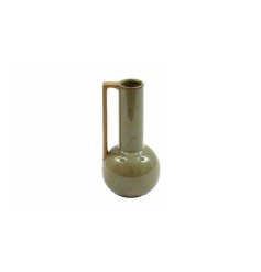 Brighten up your home with this small stunning vase with handle, in a glossy reactive green glaze,