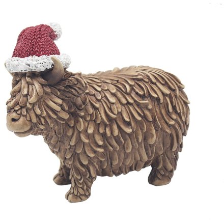 Small Highland Cow with Santa Hat