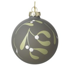 A beautiful Glass bauble decorated with a green mistletoe design