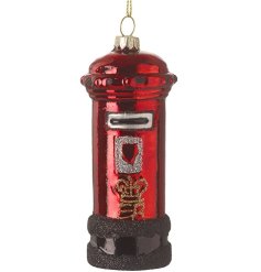 Bring a touch of nostalgia to your holiday decor with the Red Post Box Glass Hanging Decoration 