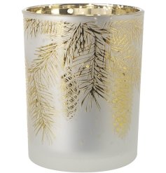 "Enhance your space with cozy vibes using this charming tea light candle holder. Perfect for adding festive flair to a