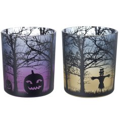 Add a touch of fright to your Halloween decor with these adorably spooky candle holders for your guests.