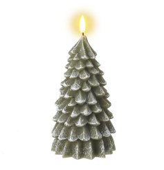 Get into the holiday spirit with a festive green Christmas tree candle that illuminates any space.