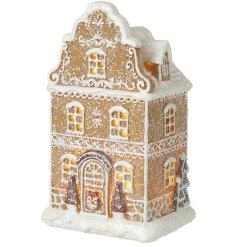 Perfect for creating a heartwarming scene in your home, this gingerbread house is a festive delight