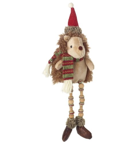 Made up of traditional Christmas colours this fabric hedgehog with wood dangly legs is the perfect shelf sitter during  
