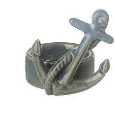 A stylish t-light holder with an anchor design and two tone blue reactive glaze finish. 
