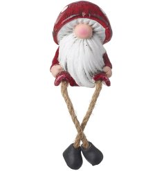 Spice up your holiday decor with this trendy mushroom gnome! Perfect for adding a touch of fun to your Christmas.