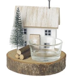 Enjoy cozy evenings with this lovely little house tea light holder
