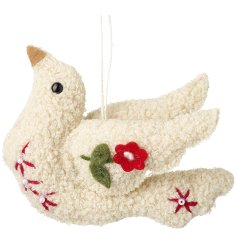 A gorgeous white sherpa hanging Christmas decoration in a dove design.
