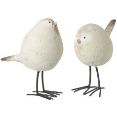 A plump stone textured bird with long black legs, perfect for a country style kitchen. 