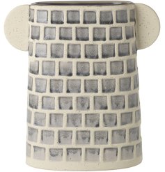 A stylish twin eared vase with a rich grey tonal pattern. 