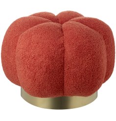 A stylish pumpkin shaped occasional stool. Made from classic boucle fabric in a chic burnt orange colour. 