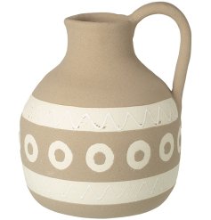A beautiful ceramic jug in neutral tones, showcasing a cream stripe and spot glaze